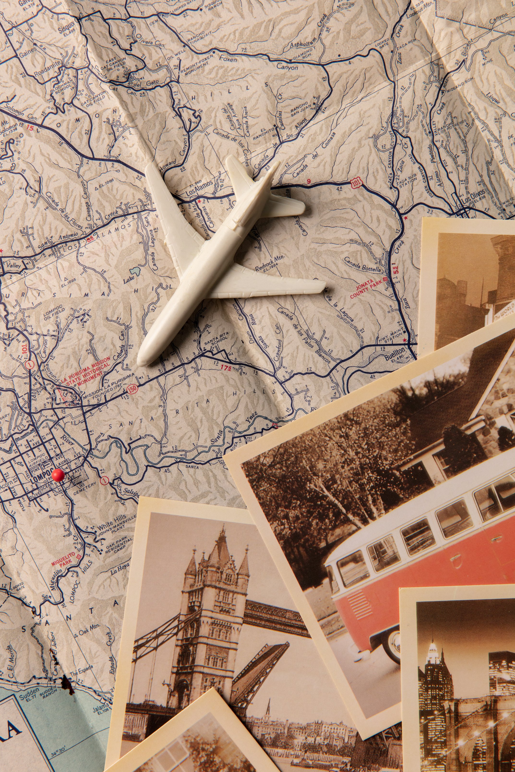 Plane Model with Old Photos on a Map 