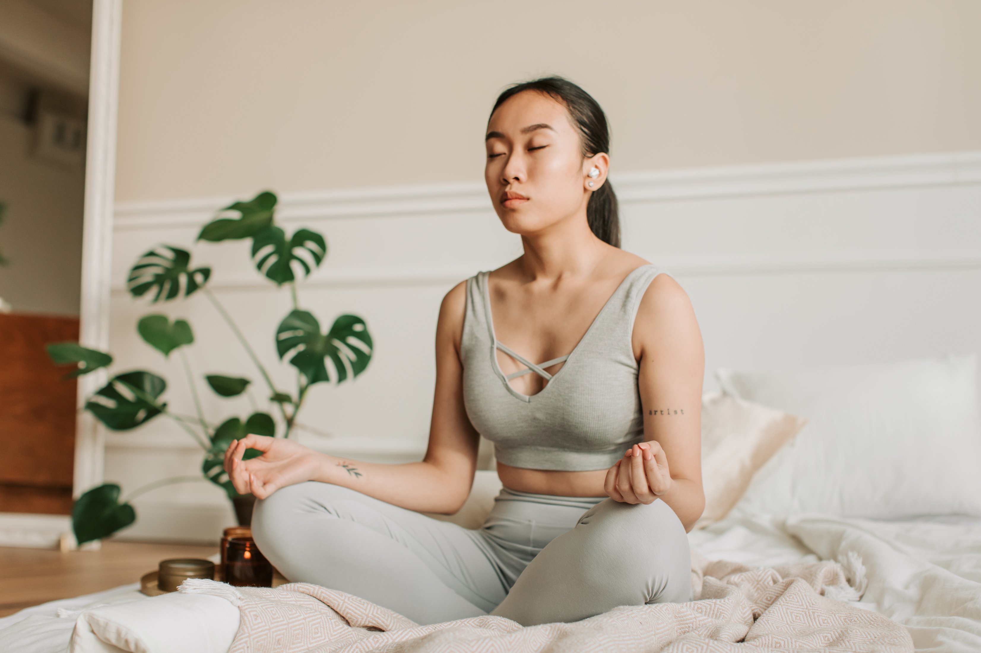 Woman Meditating at Home